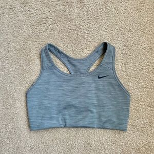 Nike Women’s size medium olive green sports bra. Never worn.